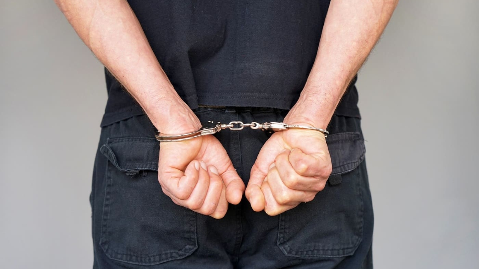 bigstock-Close-up-Arrested-Man-Handcuf