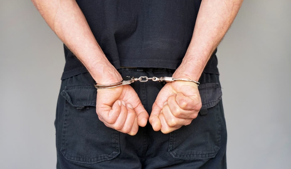 bigstock-Close-up-Arrested-Man-Handcuf